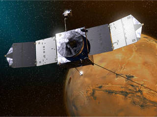 This is an artist rendition of NASA's Mars Atmosphere and Volatile Evolution, or MAVEN spacecraft orbiting Mars.