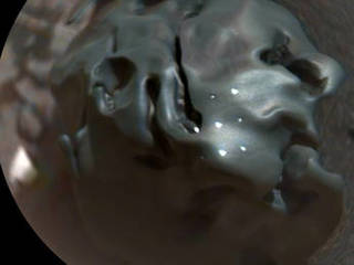 The dark, golf-ball-size object in this composite, colorized view from the ChemCam  instrument on NASA's Curiosity Mars rover is a nickel-iron meteorite, as confirmed by analysis using laser pulses from ChemCam on Oct. 30, 2016. The grid of bright spots on the rock resulted from the laser pulses.