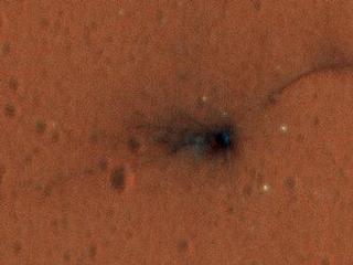 On Nov. 1, 2016, the HiRISE camera on NASA's Mars Reconnaissance Orbiter observed the impact site of Europe's Schiaparelli test lander, gaining the first color view of the site since the lander's Oct. 19 arrival. These cutouts cover locations where three parts of the spacecraft reached the ground.