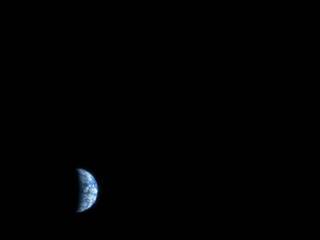 The High Resolution Imaging Science Experiment (HiRISE) camera would make a great backyard telescope for viewing Mars, and we can also use it at Mars to view other planets. This is an image of Earth and the moon, acquired on October 3, 2007, by the HiRISE camera on NASA's Mars Reconnaissance Orbiter.