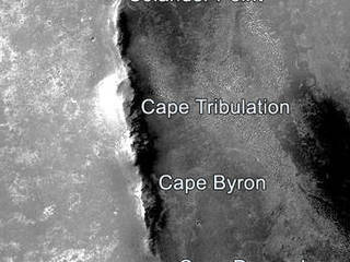 This image shows segments of the western rim of Mars' Endeavour Crater. NASA's Mars rover Opportunity has explored parts of the rim since 2011. The view covers an area about 9 miles wide. It was taken by the Context Camera on NASA's Mars Reconnaissance Orbiter.