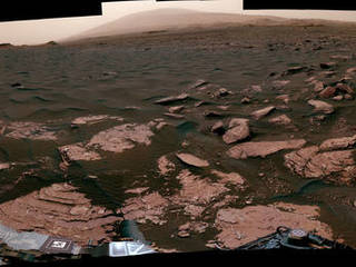 This 360-degree scene from the Mastcam on NASA's Curiosity Mars rover includes part of a linear-shaped dune the rover examined in early 2017 for comparison with what it found previously at crescent-shaped dunes. The view shows the dark, rippled surface of the active dune, near sedimentary bedrock.