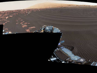 A rippled linear dune of dark Martian sand, "Nathan Bridges Dune," dominates this full-circle panorama from the Mastcam of NASA's Curiosity Mars rover. This dune was one research stop of the mission's campaign to investigate active Martian dunes. Nathan Bridges (1966-2017) helped lead that campaign
