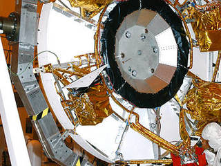 The aeroshell for Mars Exploration Rover 2 rests on end after rotation in the Payload Hazardous Servicing Facility.