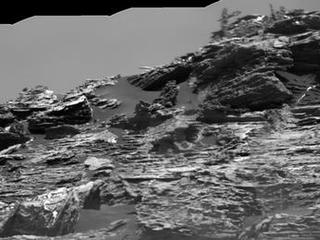 This view of "Vera Rubin Ridge" from the ChemCam instrument on NASA's Curiosity Mars rover shows sedimentary layers, mineral veins and effects of wind erosion. ChemCam's telescopic Remote Micro-Imager took the 10 component images of this scene on Aug. 24, 2017, from about 141 feet away.